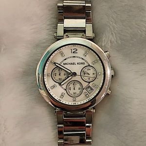 Silver Woman’s Michael Kors Watch